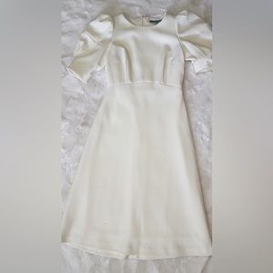 Looking for a dress for the office, a date, baptism? Here it is.